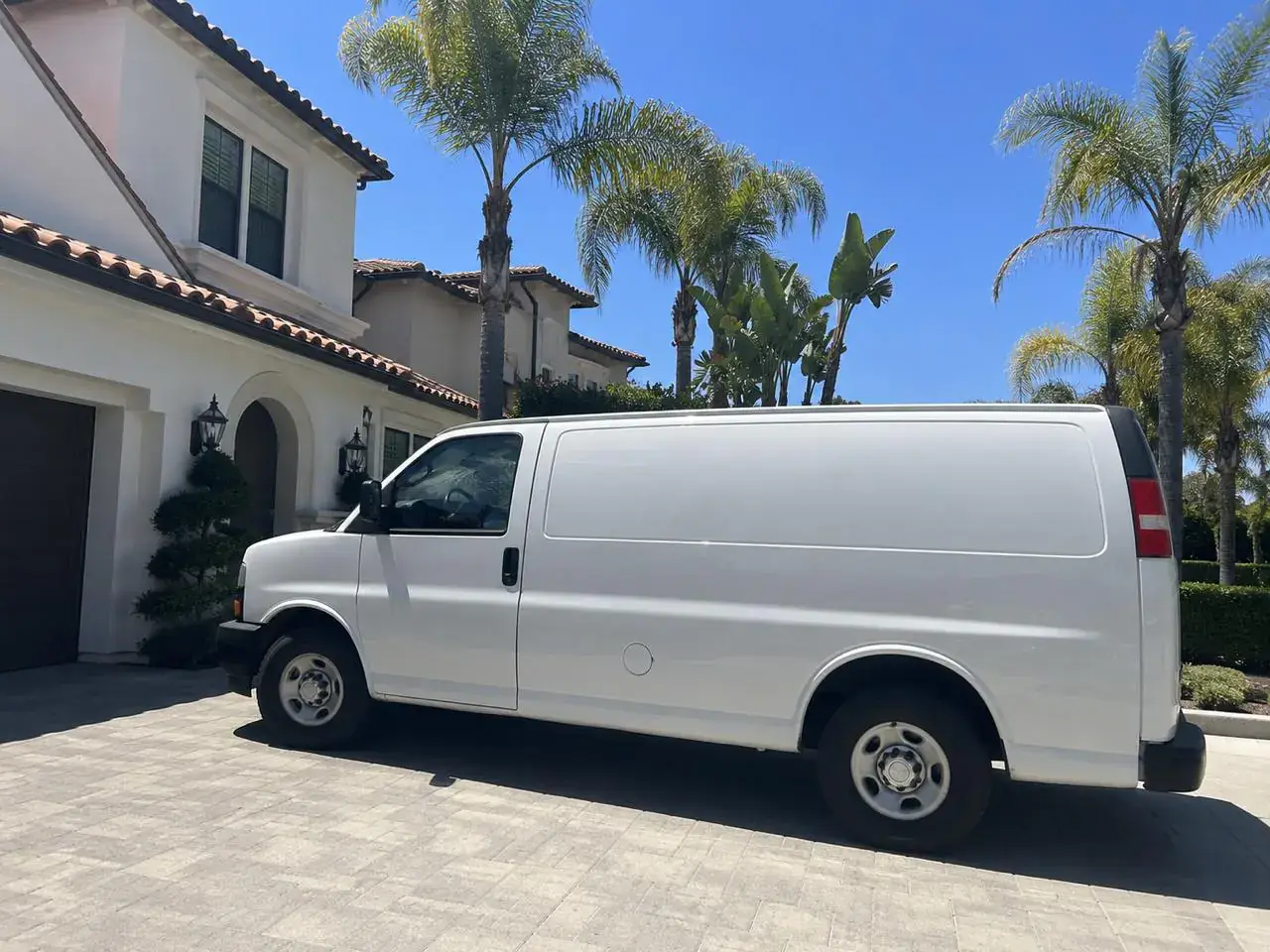 Service van parked in the driveway of an upscale Southern California home